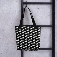 Chic Cat Pattern Tote Bag - Stylish & Practical Carry-All!  Indulge in feline charm with our chic cat pattern tote bag! This versatile accessory seamlessly blends style and functionality, making it a must-have for any cat lover. Crafted from high-quality materials, our tote bag boasts durability and long-lasting appeal. The striking black background adorned with adorable white cat silhouettes adds a playful touch to any ensemble. Cat tote bagChic carry-all stylish accessoryBlack and white toteFa Affordable Rectangular Bags With Cat Print, Cheap Black Cat Print Bag, Cheap Black Bag With Cat Print, Cheap Cat Print Bags, Affordable Rectangular Cat Print Bags, Cat Tote, Shop Till You Drop, Cat Silhouette, Tote Pattern