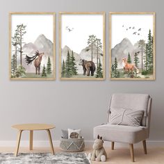 three framed art prints with animals in the woods and mountains behind them, on a wall above a chair