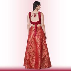 Introducing our Maroon Brocade Lehenga - a rich and regal choice for your special occasions. This stunning ensemble features a luxurious maroon brocade skirt paired with a plain sleeveless blouse adorned with a deep, elegantly plunging back featuring a chic bowtie.The matching dupatta is beautifully accented with exquisite Gold kundan work along the edges, adding a touch of opulence. Maroon, a color symbolizing passion and elegance, makes this lehenga an ideal selection for weddings and festive Plain Sleeveless Blouse, Lehenga For Wedding, Brocade Lehenga, Reception Outfits, Brocade Skirt, Kundan Work, Sari Blouse, Wedding Guests, Maroon Color