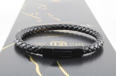 This bracelet is perfect for a modern, trendy man! Stylish and trendy for every occasion, this design is hand braided using leather. It is  great quality and is finished with a stainless steel secure locking clasp. The bracelet feels and looks very amazing on. And the best part...I can engrave a short name or date on the side, to make it the perfect, personalized gift! Choose from 3 sizes available (19cm, 21cm, 22cm) Details: ·Material: Faux Leather/polyurethane leather (looks and smells real)·C Black Leather Bracelet With Magnetic Closure As Gift, Black Bracelets With Magnetic Closure As Gift, Modern Leather Bracelet With Magnetic Closure, Elegant Black Leather Bracelet With Magnetic Closure, Valentine Gift For Dad, Personalized Leather Bracelet, Braided Leather Bracelet, Personalized Gifts For Mom, Mens Leather Bracelet