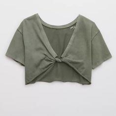 “Aerie Flip Out T-Shirt” In Olive Green Size Xs This Is A Reversible Shirt And Super Cute Styled With The Twisted Knot In The Front Or The Back. Super Casual Summer Look. Pretty With A Styled Bralette Or Sports Bra. Soft Jersey Material With Raw Cut Hem. 100% Cotton. Comfortable, Quality Material With A Bit Of Thickness To The Fabric So It Is Durable But Yet Still Relaxed And Casual. It Has A Casual Fit. Item Is In Perfect Condition. Never Worn And No Damage. Tags Attached, See Last Photo. I Bou Casual Crop Top For Loungewear, Casual Soft-washed Crop Top For Summer, Soft-washed Casual Summer Crop Top, Casual Soft-washed Summer Crop Top, Green Cotton Crop Top For Loungewear, Green Casual Crop Top For Loungewear, Twisted Crop Top, Muted Green, Flip Out