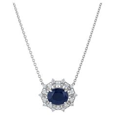 This charming estate necklace is exquisitely crafted with a stunning oval 6 carat blue sapphire that measures 13.02mm x 10.30 mm x 5.98 mm and diamond pave in 14 karat white gold. Treat yourself to a timeless piece of luxury today! -Oval Sapphire Diamond Pave Estate Necklace -14 karat White Gold -Oval Blue Sapphire -Sapphire: 6.00ct TW (13.02mm x 10.30mmx5.98mm) -Diamond Pave: 20pcs Est. 1.30ct F/G SI2 -Estate Necklace Pave Necklace, Sapphire Diamond, Pave Diamonds, Timeless Pieces, Blue Sapphire, Jewelry Necklace Pendant, Sapphire, Jewelry Necklaces, White Gold