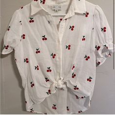 White Blouse With Embroidered Red Cherries, Never Worn. Make An Offer Because We Are Moving! Red Shirt For Spring And Summer, Red Vacation Shirt For Spring, Cute Red Cotton Blouse, Cute Red Summer Blouse, Red Strawberry Print Top For Summer, Casual Red Blouse With Floral Embroidery, White Summer Tops With Cherry Print, Red Strawberry Print Tops For Spring, Red Cherry Print Tops For Spring