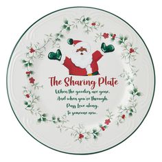 a plate with santa clause on it and holly wreath around the edge that says, the sharing plate