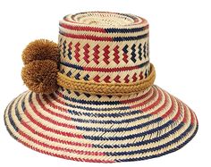 These hats are handmade by the men of the Wayuu tribe, both in Colombia and Venezuela. Iraca palm fiber is treated and dyed, and it takes around 8 hours of work to make. Because of the way they are weaved, the hats can be made smaller or wider, which makes them fit many heads. They can be worn fully down (to protect your face), front down and back up, or totally up. Pompoms are very important in the Wayuu culture. Bigger pompoms mean that you have financial comfort. This hat measures about 21in Multicolor Woven Toquilla Straw Sun Hat, Handwoven Multicolor Straw Hat, Multicolor Handwoven Straw Hat, Bohemian Braided Palm Leaf Sun Hat, Artisan Handwoven Panama Hat For Vacation, Artisan Handwoven Sun Hat For Vacation, Artisan Handwoven Hat For Vacation, Handwoven Multicolor Straw Hat With Curved Brim, Multicolor Handwoven Toquilla Straw Hats