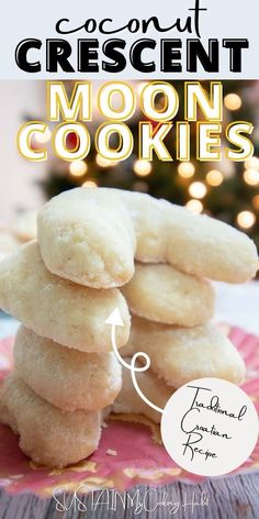 coconut crescent moon cookies stacked on top of each other