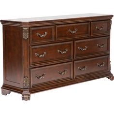 a large wooden dresser sitting on top of a white floor