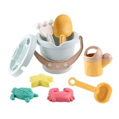 a toy kitchen set with utensils and cooking utensils in the bowl