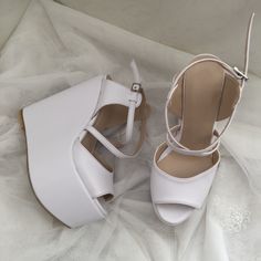 Anatomical base structure 6 cm , 8 cm , 10 cm ,11cm ,12cm 13cm or 14 cm heel length Special non-slip bottom sole Ivory or white We can make with or without lace An indispensable part of the wedding day . A combination of elegance and comfort. It is a product that you will feel as if you are wearing sports shoes with the comfort of padding heel. Summer Wedding Shoes With Platform, White Closed Toe Wedge Sandals With Platform, Elegant Platform Wedge Sandals For Wedding, Open Toe Platform Sandals For Wedding, White Party Wedge Sandals, White Wedge Heel Sandals For Party, White High Heel Platform Wedge Sandals, Wedding Sandals With Heel Strap And Wedge Heel, Wedge Heel Sandals With Heel Strap For Wedding