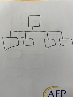 a piece of paper that has been drawn on with squares and rectangles in it