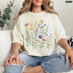 #Comfort Colors Wildflower Shirt, Flower Shirts, Aesthetic Wildflower Shirt, Botanical Floral, Minimalist Shirts for Women, Botanical Shirt Welcome to our shop! Discover the perfect blend of comfort and style with our premium Comfort Colors 1717 t-shirts. Ideal for everyday wear, our tees are made with high-quality fabric that gets softer with each wash. 🌟 Product Details: - Brand: Comfort Colors - Style: Unisex 1717 T-Shirt - Material: 100% ring-spun cotton (soft-washed garment-dyed fabric) - Available Sizes: S, M, L, XL, 2XL, 3XL (see sizing chart in product images) ✨ How to order: Choose your preferred shirt size and color. Specify the number of shirts you want, then click "Add to Cart." Proceed to place your order. At checkout, include any extra details in the "Note to Seller" section Spring Botanical Shirt With Relaxed Fit, Long Sleeve T-shirt With Plants Print For Spring, Botanical Style Shirt With Relaxed Fit For Summer, Botanical Style Relaxed Fit Spring Shirt, Botanical Relaxed Fit Spring Shirt, Botanical Style Relaxed Fit Shirt For Summer, Spring Botanical Shirt With Floral Print, White Botanical Shirt For Summer, White Spring Shirt With Plant Print