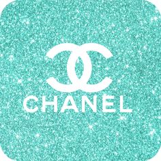 the chanel logo on a blue glitter background