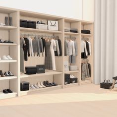 an open closet with clothes and shoes on shelves