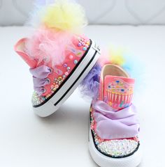 How adorable are these Cupcake inspired converse! The perfect shoe to complete the look! Please leave your name needed in the notebox during checkout Visit the tutu section or search bar for the matching outfit! If you are unsure of sizing please scroll to the last photos for our size charts, or visit our size charts here--> https://pinktoesnhairbows.com/pages/size-chart All sales are FINAL, Ship dates can be found directly on the listing, please view our policies in detail here---> https://pink Pink Round Toe Sneakers For Birthday, Cute High-top Sneakers For Parties, Pink High-top Sneakers For Party, Cute Party Sneakers, Cute High-top Sneakers For Birthday, Fun High-top Sneakers For Birthday, Shoe Cupcakes, Overalls Boys, Tutu Dress Costumes