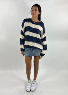 Stay cozy and chic in our Striped Oversized Cable Knit Sweater. The bold stripes add a pop of style, making it easy to pair with your favorite jeans or leggings. Whether you're lounging at home or out and about, this sweater delivers effortless comfort and a trendy look! The Details Cable Knit Striped Pattern Oversized Fit 80% Acrylic 20% Nylon [#other] Hand wash cold separately Do not wring or twist Lay flat to dry Dry clean [/other] Casual Knit Sweater With Contrast Stripes, Trendy Striped Chunky Knit Sweater, Spring Striped Chunky Knit Sweater, Oversized Striped Chunky Knit Sweater, White Casual Sweater With Contrast Stripes, Casual Blue Sweater With Contrast Stripes, Navy Casual Sweater With Contrast Stripes, Oversized Cable Knit Sweater, Going Out Skirts