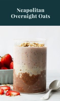 a dessert in a glass with strawberries on the side and text overlay reading neapolian overnight oats