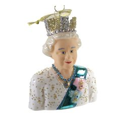 a glass figurine of queen elizabeth holding a cell phone in her right hand