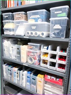 the shelves are filled with plastic storage containers