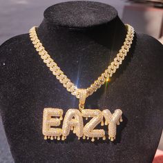 "Iced Out Custom Drip Name Necklace,Cuban Link Chain,Gift for Him,Personalized Name Pendants,Cubic Zircon Hip Hop Jewelry, Custom Name Chain 🏅it is a trendy baguette letter cubic zircon  font letter pendants.made of brass and cubic zircon  stones, White color stones 🏅Each Piece Comes With Chain 🏅Each Piece Packed with Gift Box 🏅100% Made to Order Handmade item Materials: AAAA Cubic Zirconia Stones, Brass Can be personalized Length of Chain: 16\"/18\"/20\"/24\" 🏅Birthday gift for her*Elegant Gold Dangle Necklace With Bling, Name Chain, Aniversary Gifts, Tekken 7, Mens Rings Fashion, Bridemaids Gifts, Gold Chains For Men, Color Stones, Hip Hop Jewelry