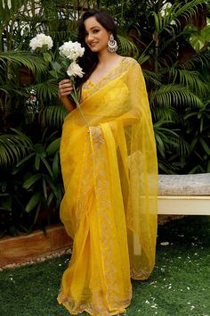 Bumblebee yellow silk organza saree with cutdana, bead, sequin embroidered leaf motifs. Paired with satin silk blouse.
Components:2
Pattern:Embroidery
Type of Work:Cutdana, bead, sequin, leaf
Neckline:Sweetheart
Sleeve Length:Sleeveless
Fabric:Pure silk organza, satin silk
Color:Yellow
Other Details:
Back scoop neck
Back cutwork blouse
Occasion:Wedding - Aza Fashions Yellow Organza Saree, Summer By Priyanka Gupta, Organza Saree With Blouse, Farewell Saree, Saree Inspiration, Embroidered Leaf, Cutwork Blouse, Haldi Outfit, Yellow Saree