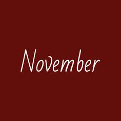 the word november written in white on a red background