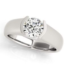 a white gold ring with a round diamond in the center, on a white background