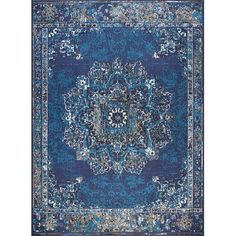 a blue rug with an ornate design on the center and bottom corner, in front of a