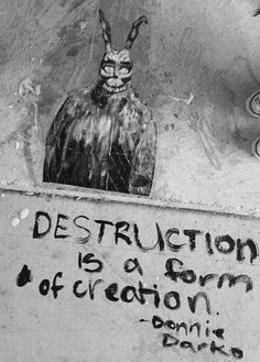 graffiti on the side of a building with an image of a bird and caption that reads destruction is a form of creation