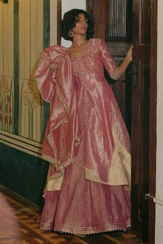 Pink jacket with paisley motif and stripe embroidery. Paired with a crushed tissue skirt with attached cancan and pearl latkans at the hem and dupatta with floral embroidery, sequins and pearl tassels. - Aza Fashions Aditi Gupta, Stripe Embroidery, Pearl Tassels, Jacket And Skirt Set, Paisley Jacket, Paisley Motif, Taffeta Skirt, Dress Design Patterns, Purple Fabric