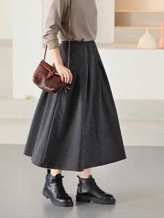 Details: Gender: Women Item Type: Skirt Material: Cotton Season: Spring, Autumn Pattern: Solid Style: Casual, Loose, Retro Waist Type: Elastic Waist Size: One Size Waist: 64.00 - 100.00 cm/ 25.20 - 39.37 " Length: 79.00 cm/ 31.10 " Casual Solid Color Winter Pleated Skirt, Casual Gray Relaxed Skirt, Casual Gray Long Skirt, Casual Long Gray Skirt, Casual Gray Flowy Skirt, Gray Flowy Casual Skirt, Fall Gray Skirt With Pockets, Winter Midi Skirt With Pockets, Winter Full Skirt Bottoms With Pockets