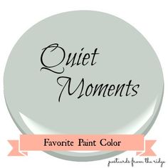 a white button with the words quiet moments on it