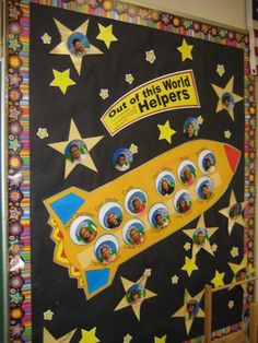 this is an image of a bulletin board with stars and a yellow submarine on it