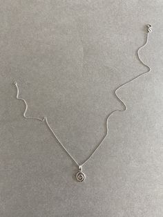 Silver Tiny Mini Swirl Necklace - Sterling Silver Color : Silver Material : Sterling Silver Swirl Size : 10mm Chain Length : 16 inches / 18 inches / 20 inches * Metal components are Sterling Silver. * Suitable for delicate and sensitive skin. * Comes in a jewelry box. If you need extra boxes for gifting....just let us know! Swirl Necklace, Silver Prices, Holiday Time, Silver Material, Necklace Sterling Silver, Chain Lengths, Chain Length, Beautiful Necklaces, Silver Color