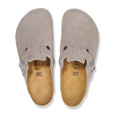 So classic and consistently comfortable, the Boston clog has become a coveted, year-round favorite. Soft suede lends an effortless feel to the style. Complete with an original contoured footbed that'll feel uniquely yours wherever you wear it. Contoured footbed for legendary BIRKENSTOCK® support Classic suede upper Suede footbed lining helps keep you comfortable EVA sole is flexible & lightweight Adjustable strap with metal pin buckle Made in Germany Suede Closed Toe Clogs With Arch Support, Classic Suede Clogs With Cork-bed Midsoles, Classic Suede Clogs With Rubber Sole, Classic Suede Clogs With Cushioned Footbed, Classic Suede Clogs With Removable Insole, Classic Closed Toe Clogs With Suede Lining, Classic Suede Closed Toe Clogs, Classic Closed Toe Suede Clogs, Trending Winter Boots