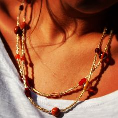 Double Strand Gold Orange and Red Necklace by uniquebeadingbyme, $25.00 Multi-strand Czech Glass Beaded Necklace With Polished Beads, Bohemian Double Strand Beaded Necklaces With Gold Beads, Gold Double Strand Beaded Necklaces With Tiny Beads, Bohemian Double Strand Gold Beaded Necklaces, Gold Double Strand Beaded Necklace With Tiny Beads, Bohemian Double Strand Gold Beads Necklace, Bohemian Gold Multi-strand Crystal Necklaces, Bohemian Double Strand Gold Beaded Necklace, Gold Double Strand Bohemian Beaded Necklace