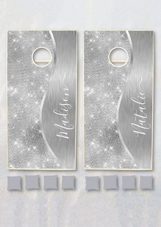 two door hangers with the words happy new year written in silver foil on them