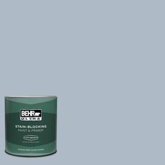 a can of behrut ultra stain - blocking paint on a gray background with the words