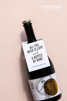 a bottle of wine with a label on it that says, all you need is love and a bottle of wine