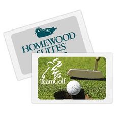 a white business card with a golf ball on it and the logo for homewood suites