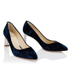 Description
Sizing / Details
Shipping / Return




NIGHT BLUE VELVET COURT SHOE WITH ROSE GOLD-PLATED HEEL.
In this new season we have redesigned our 7 cm last to make it even more comfortable and elegant, and Diana is the perfect example of this. 
In this model, the texture of Italian velvet in a night blue tone stands out. A water effect with which the different shades that the velvet acquires as the light hits it are perfectly appreciated.. 
Its rose silver reverspective heel brings lightness to the design and gives it a sophisticated touch while protecting the heel from any possible rubbing. 
It also has an internal gel padding of approximately one centimeter, so it has the advantages of a platform without sacrificing the elegance of the classic pump.



SIZING: 

 
This model has the Water Effect, Custom Made Shoes, Nude Shoes, Metallic Shoes, Classic Pumps, Silver Heels, Court Shoes, Party Shoes, Blue Tones