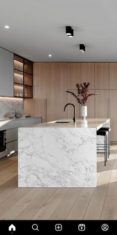 an image of a kitchen setting with marble countertops and wooden cabinets in the background