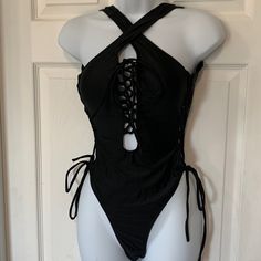 New Never Used Black Cross Cross Detail Straps Can Be Used In Multiple Ways As Shown Above Goth One Piece Swimsuit, Black Cross-tied Beachwear Swimwear, Spring Black Strappy Swimwear, Black Strappy Swimwear For Spring, Gothic Bathing Suits, Goth Swimsuit Bikinis, Gothic Swimwear, Goth Swimsuit, Gothic Swimsuit