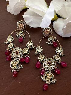 This pair of earrings has its own quirky charm. These earrings come as a perfect accessory to elevate your look from drab to delightful. One word that perfectly describes these earrings is royal. These earrings get their sophisticated look from the intricate design-work done on them. Each pattern is flawless and is the result of the meticulous attention to details craftsmen. 100% Satisfaction Guarantee: Long Lasting Plating, High-Quality Stones, Highest quality and craftsmanship. Gifting: This p Single Chandbali Earring For Festive Occasions, Festive Chandbali Single Earring, Diamond Earrings Wedding, Earring Indian, Sabyasachi Jewelry, Pakistani Earrings, Sabyasachi Jewellery, Kundan Earrings, Indian Earrings