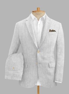 Maintain a distinct professional appearance by adding an extra bit of flair with our Italian Zod Light Gray Linen suit. Crafted from linen, this suit will keep you cool, sharp and stylish in summers. Combine it with a matching waistcoat, a crisp white and brown derby shoes.   Look Includes  Italian Zod Light Gray Linen Fabric  Two Button Jacket Style  Notch Lapel   Corozo   Beige  Buttons  Single Vent  Three Cuff Buttons  Two Welted Back Pockets on Trousers    You can change the look during cust Fitted Linen Suit With Pressed Crease, Fitted Linen Suits With Pressed Crease, Elegant Fitted Linen Sport Coat, Summer Linen Business Suits, Elegant Summer Suits With Welt Pockets, Fitted Linen Blazer With Flat Front, Fitted Business Casual Sport Coat For Summer, Fitted Sport Coat For Business Casual In Summer, Luxury White Linen Suits