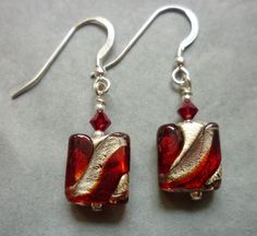 Red glass and silver foil Murano glass square earrings topped with red Swarovski crystals and silver beads. Sterling silver ear wires. Drop 4 cm (1.5 inches) Murano Glass Earrings, Red And Silver, Earrings Red, Square Earrings, Silver Foil, Glass Earrings, Red Glass, Murano Glass, Sterling Silber