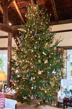 a decorated christmas tree in a living room