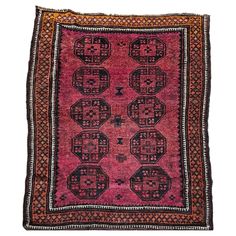 an old rug with black and red designs on the bottom, surrounded by small circles