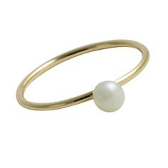 apop Exclusive, mini pearl ring, elegant and chic silver mini pearl ring. Made of .925 sterling silver. Smooth polished finish band. Features beautiful seed pearl at center. Can be worn alone or paired with complementing mini pearl earrings. Ideal for: Daytime wear, Date Night, Office Measurements: pearl: 3mm; 1mm band width Material: Cultured Pearl, 925 Sterling Silver, Rose/Goldtone Finish Ring Guide, Ring Elegant, Coin Earrings, Seed Pearl, Gold Dipped, Jewelry Pouch, Pearl Ring, Cultured Pearls, Date Night