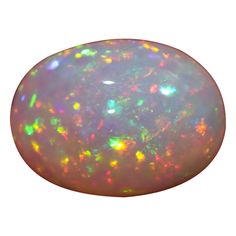 an oval shaped opal with multicolored lights