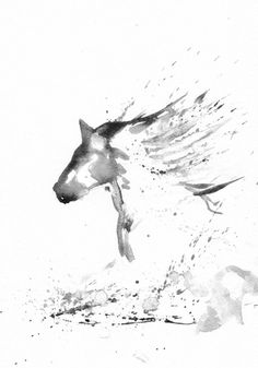 a horse is running through the snow with its wings spread